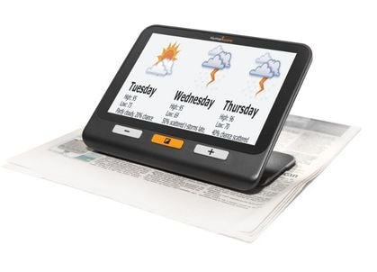 8 inch electronic magnifier placed over newspaper