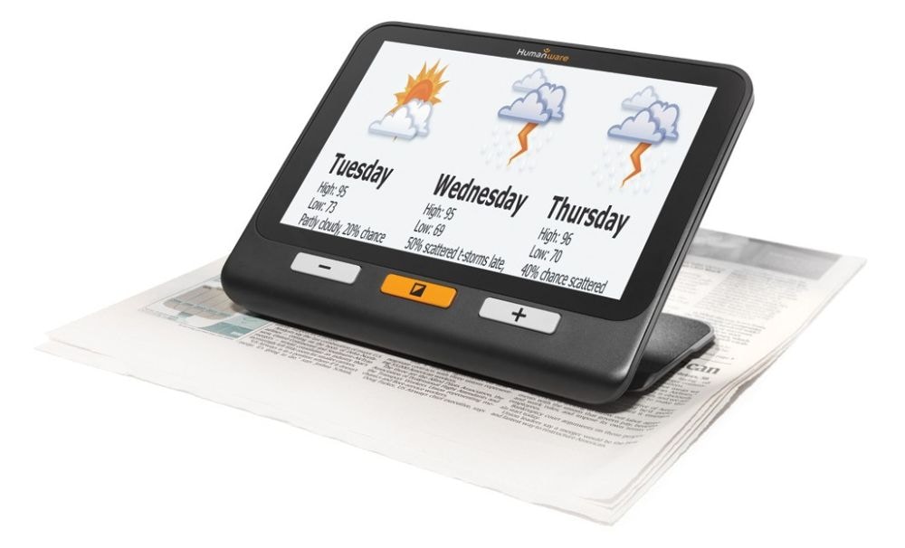 8 inch electronic magnifier placed over newspaper